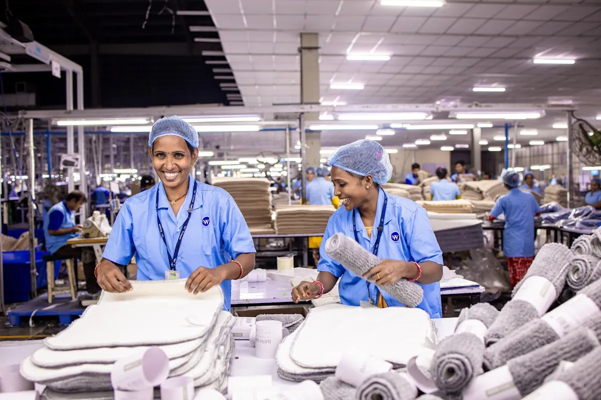 Manufacturing team implementing 5S organization in production facility