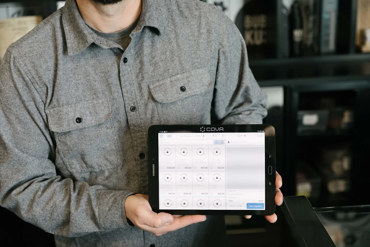 Team member checking inventory on a tablet